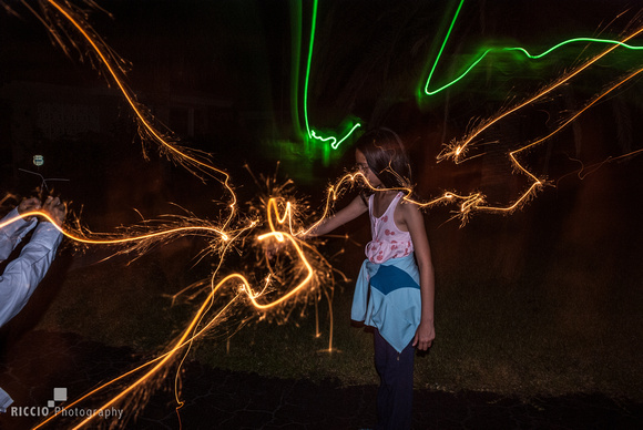 Light painting of kids with sparklers. Photographed by Maurizio Riccio