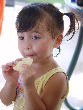 Young girl snacking